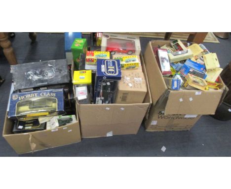 A collection of mostly boxed diecast and other model cars and vehicles including Burago, Vanguard and Ertl (qty)please see fu