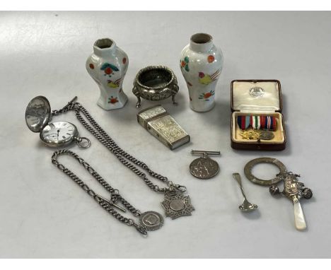 A silver bound mother-of-pearl case, a silver full hunter pocket watch, two silver watch chains with fobs and silver plated c