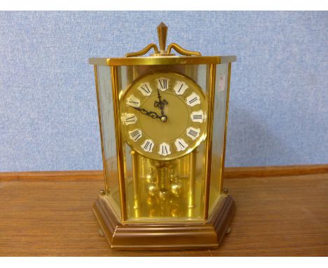 A German brass anniversary clock
