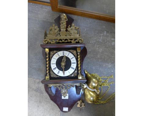 A Dutch mahogany and brass wall clock