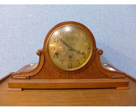 A 1920's Garrard Supreme oak mantel clock