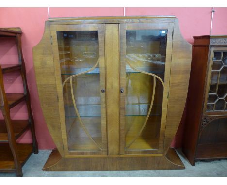 An Art Deco walnut display cabinet