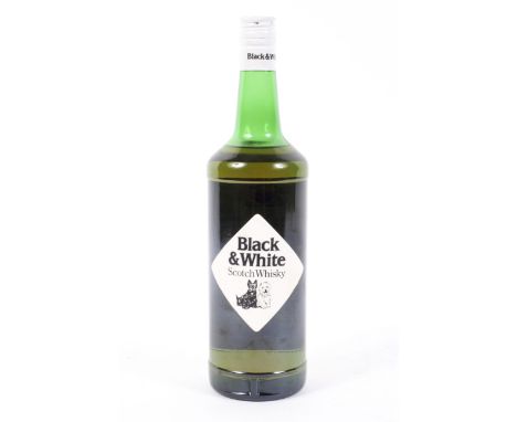 A vintage bottle of Black &amp; White Choice Old Scotch Whisky, distilled, blended and bottled in Scotland by James Buchanan
