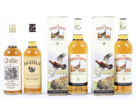 Two bottles The Famous Grouse finest scotch whisky, 1L., 43% Vol., boxed; Ghillie Pure Malt scotch whisky, R.B. Smith &amp; S