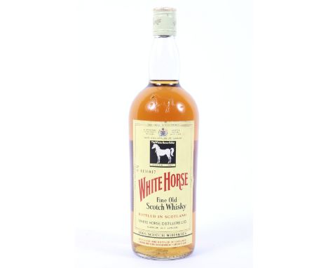 A vintage bottle of White Horse Fine Old Scotch Whisky, bottled in Scotland by White Horse Distillers, no 1136017