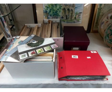 A large quantity of first day covers in boxes &amp; an album COLLECT ONLY