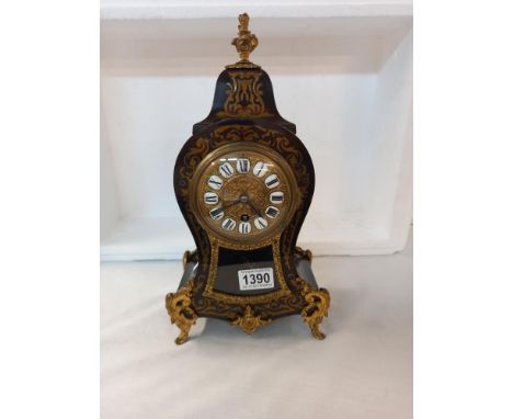 A 19th Century French brass inlaid clock 