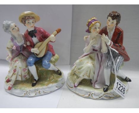 A pair of porcelain figures marked M R. 