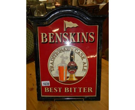 An old Benskins Best Bitter enamel sign in cast metal wall mount with wooden backing, COLLECT ONLY.