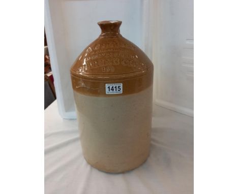 A 2 gallon stoneware flask for A C Simson Wine and Brandy Merchant 43 Craven Street Charing Cross A/F 