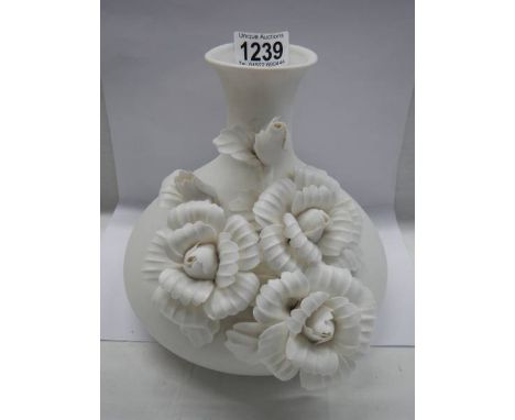 A good 20th century white ceramic vase with applied chrysanthemums. 