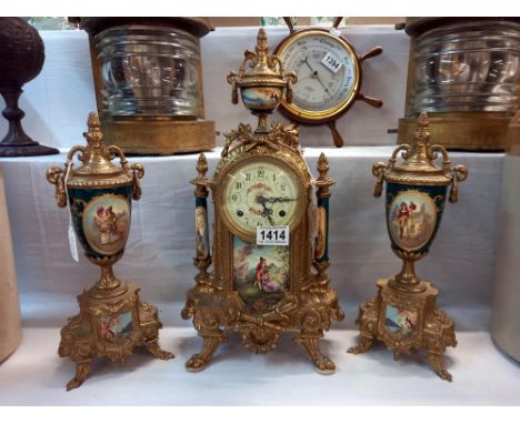 A three piece French clock set comprising ormolu and enamel clock with two sidepieces, COLLECT ONLY. 