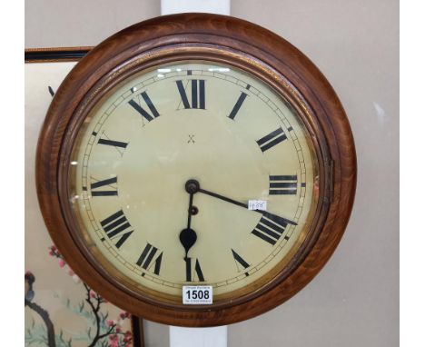 A Round spring wound wall clock 