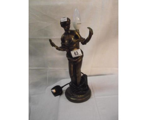 An art deco style bronzed resin figurine table lamp missing shade