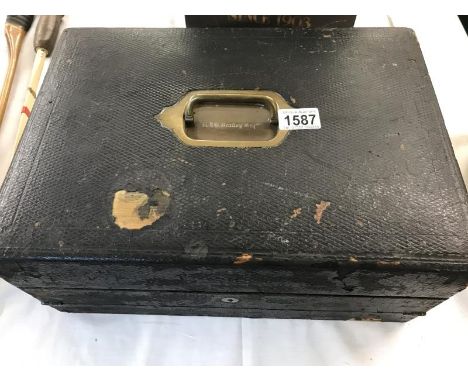 An Edwardian A.F.Donagan Cambridge writing box complete with inkwell and match striker, The brass handle inscribed R J M Bent