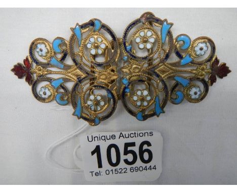 An early to mid 20th century enamel buckle. I have the following information Brass with gilt finish, No Visible makers marks