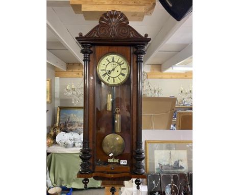 A Victorian mahogany Vienna double weight wall clock 