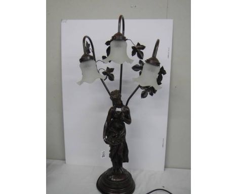 A tall figural three light table lamp, COLLECT ONLY. 