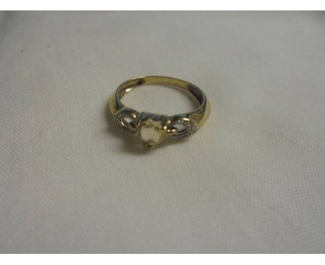 A 9ct yellow gold diamond and citrine ring, size M half, 1.84 grams. 