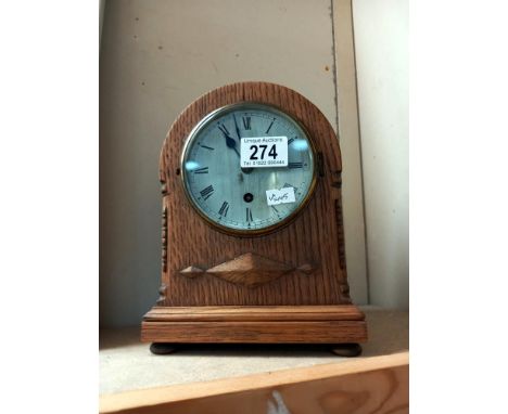 A J.A. Haskell Ipswich oak cased mantle clock with silvered dial COLLECT ONLY