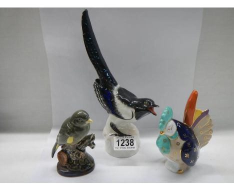 Three ceramic bird figure marked USSR, Bellwood and Barmouth pottery. 