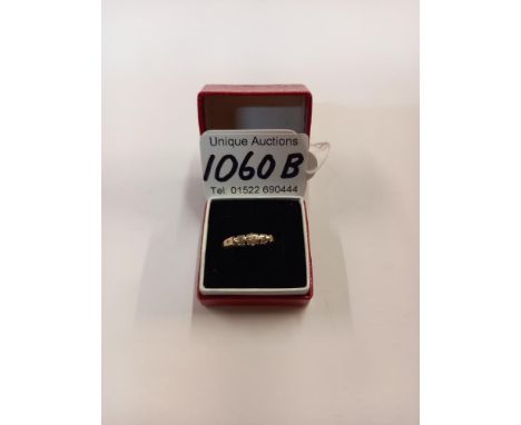 A vintage diamond set 3 stone ring, London hallmark 