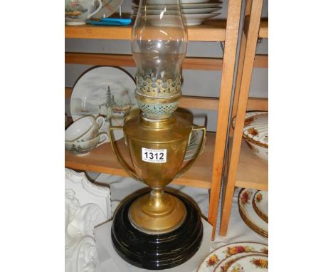 A Victorian oil lamp on pot base. COLLECT ONLY. 