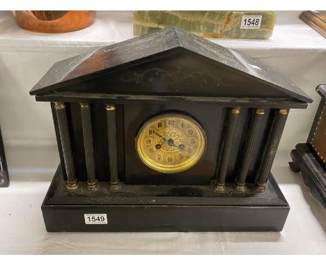 A large black Palladian style mantel clock a/f 