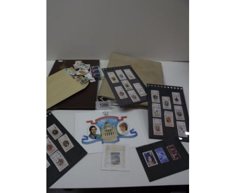 Two stamp albums - A Royal Wedding ring binder ready to be made up with a collection of stamps and another album with a colle