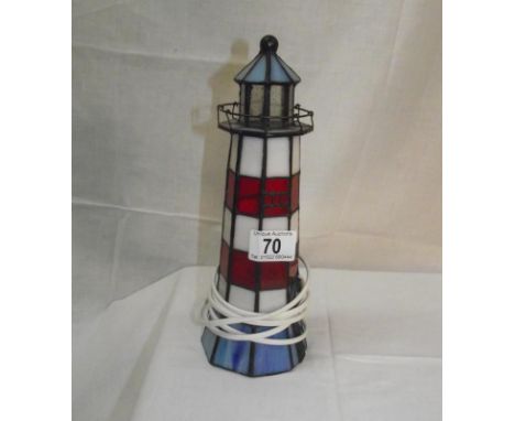 A leaded coloured  glass lighthouse table lamp 