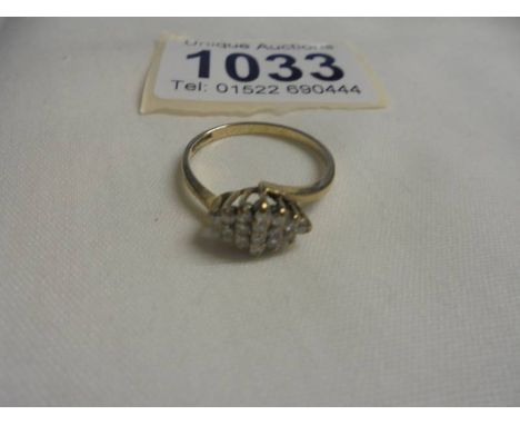 A diamond shaped yellow gold and citrine ring, size O half, 1.89 grams. 
