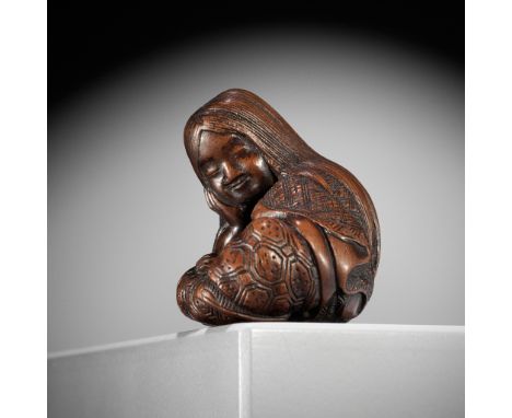 MASATOSHI: A NAGOYA SCHOOL WOOD NETSUKE OF A SLUMBERING SHOJOBy Masatoshi, signed Masatoshi 正利Japan, Nagoya, mid-19th century