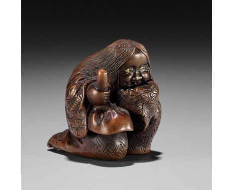 NOBUKAZU: A WOOD SHUNGA NETSUKE OF OKAME WITH TENGU MASK  By Nobukazu, signed Nobukazu 信一 to 刀Japan, 19th century, Edo period