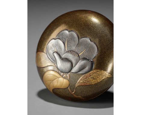 A VERY FINE LACQUER MANJU NETSUKE WITH BLOSSOMING UME (PLUM)UnsignedJapan, 19th century, Edo period (1615-1868)The two-part m