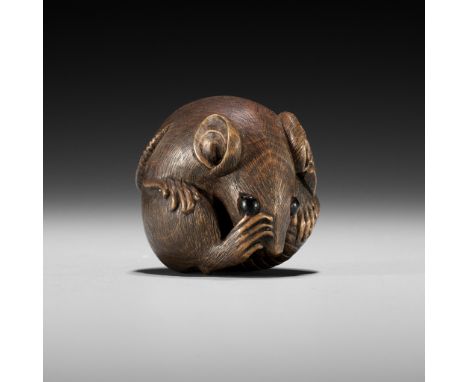 MASASHIGE: A YAMADA SCHOOL WOOD NETSUKE OF A COILED RATBy Masashige, signed Masashige 正重Japan, Yamada, Ise Province, mid to l