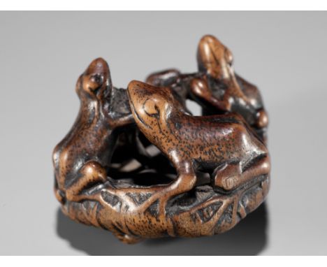 SEIMIN: A FINE WOOD NETSUKE OF A FROGS ON A LOTUS LEAFBy Seimin, signed Seimin 晴民Japan, Iwashiro Province, mid-19th century, 