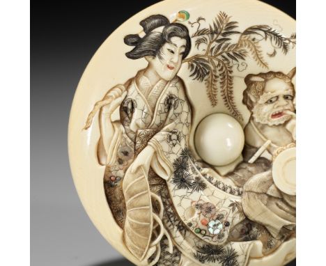 KIKUGAWA: A LARGE IVORY MANJU NETSUKE DEPICTING THE WISTERIA MAIDEN (FUJI MUSUME) AND A REPENTANT ONI (ONI NO NENBUTSU)By a m