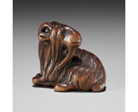 A FINE WOOD NETSUKE OF A GOATUnsignedJapan, late 18th to early 19th century, Edo period (1615-1868)A well-sized wood netsuke 