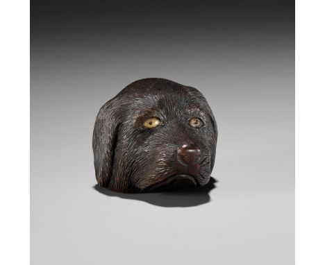 CHIKUSAI: A RARE WOOD NETSUKE DEPICTING THE HEAD OF A DOGBy Chikusai, signed Chikusai 竹齋Japan, Edo (Tokyo), mid to late 19th 