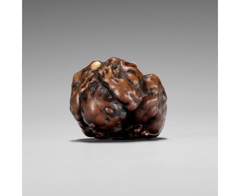 MASATOSHI: A FINE NAGOYA SCHOOL WOOD NETSUKE OF A COWERING ONI DURING SETSUBUNBy Masatoshi, signed Masatoshi 正利Japan, Nagoya,