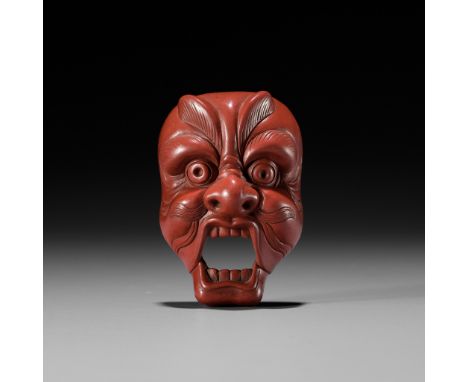 JOKO: A RARE TSUISHU (RED LACQUER) BUGAKU MASK NETSUKE OF GENJORAKUBy Joko, signed Joko 如光Japan, Tokyo, second half of 19th c