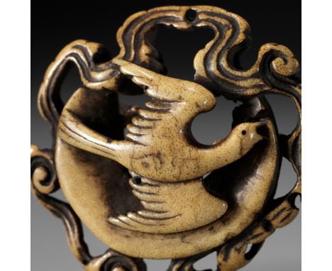 A FINE STAG ANTLER RYUSA MANJU NETSUKE OF A CUCKOO AND MOON (TSUKI NI HOTOTOGISU), ATTRIBUTED TO RENSAIAttributed to Ishikawa