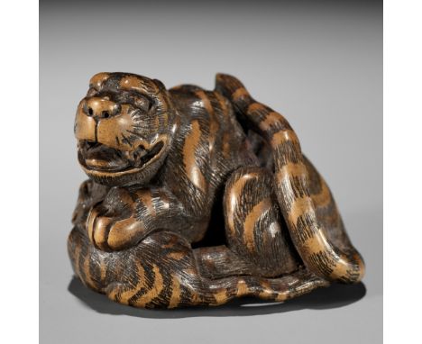 KOKEI: A WOOD NETSUKE OF A TIGER AND CUBBy Kokei, signed Kokei 虎溪Japan, Kuwana, Ise Province, first half of 19th century, Edo