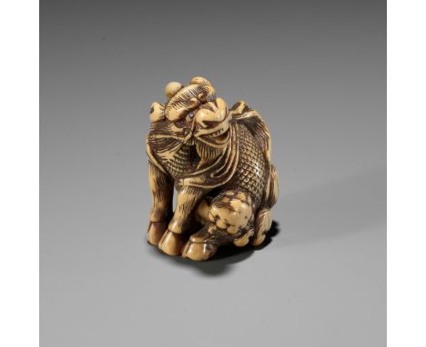 GYOKUZAN: AN IVORY NETSUKE OF A KIRINBy Gyokuzan, signed Gyokuzan 玉山Japan, Kyoto, late 18th century, Edo period (1615-1868)Fi