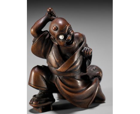 SHOKO: AN AMUSING WOOD NETSUKE OF A BLINDMAN AND PUPPYBy Shoko Sugonoya, signed Shoko 尚古Japan, Hida-Takayama, second half of 