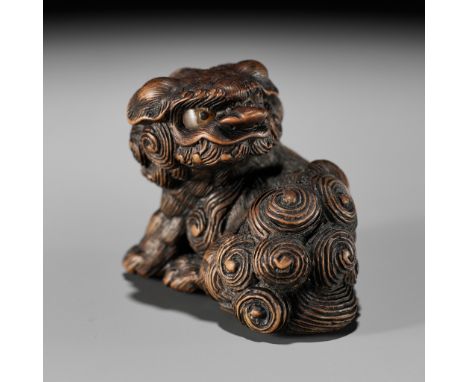 TOYOKAZU: A FINE TANBA SCHOOL WOOD NETSUKE OF A SHISHIBy Shugasai Toyokazu, signed Toyokazu 豊一Japan, Sasayama, Tanba province