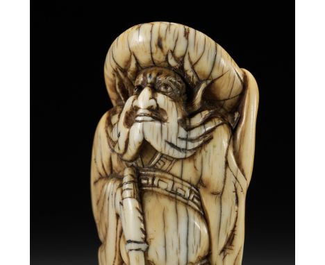 A GOOD KYOTO SCHOOL IVORY NETSUKE OF SHOKI, ATTRIBUTED TO OKATOMOAttributed to Yamaguchi Okatomo, unsignedJapan, Kyoto, 18th 