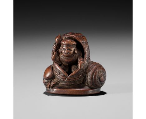 MIWA: A CHARMING WOOD NETSUKE OF DAIKOKU EMERGING FROM A RICE BALEBy Miwa, signed Miwa 三輪 with kakihanJapan, Edo (Tokyo), fir