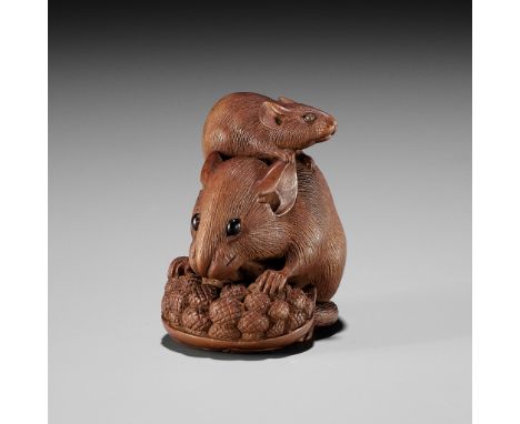 IKKO: A WOOD NETSUKE OF RATS AND MILLETBy Ikko, signed Ikko 一光Japan, late 19th centuryFinely carved as a group of two rats, t