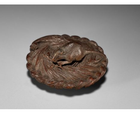 MORITA SOKO: A SUPERB SMALL WOOD NETSUKE OF A RAT ON A STRAW RICE BALEBy Morita Soko (1879-1942), signed Soko 藻己 to 刀Japan, T